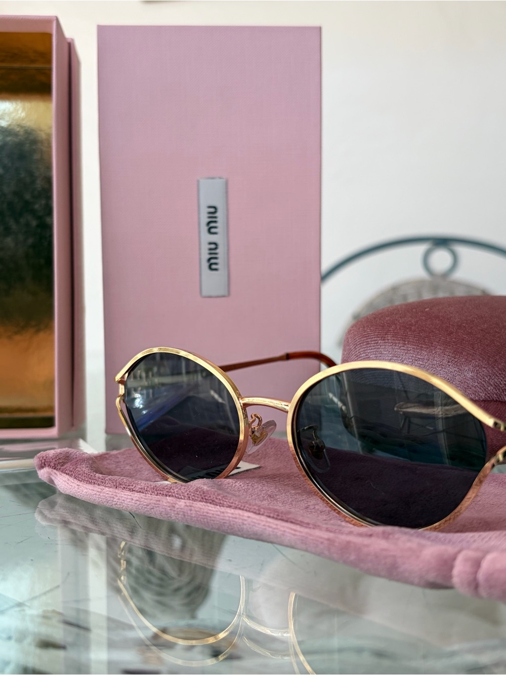 Miu Miu Gold Round Metal Frame Sunglasses with Dark Lenses and Pink Case